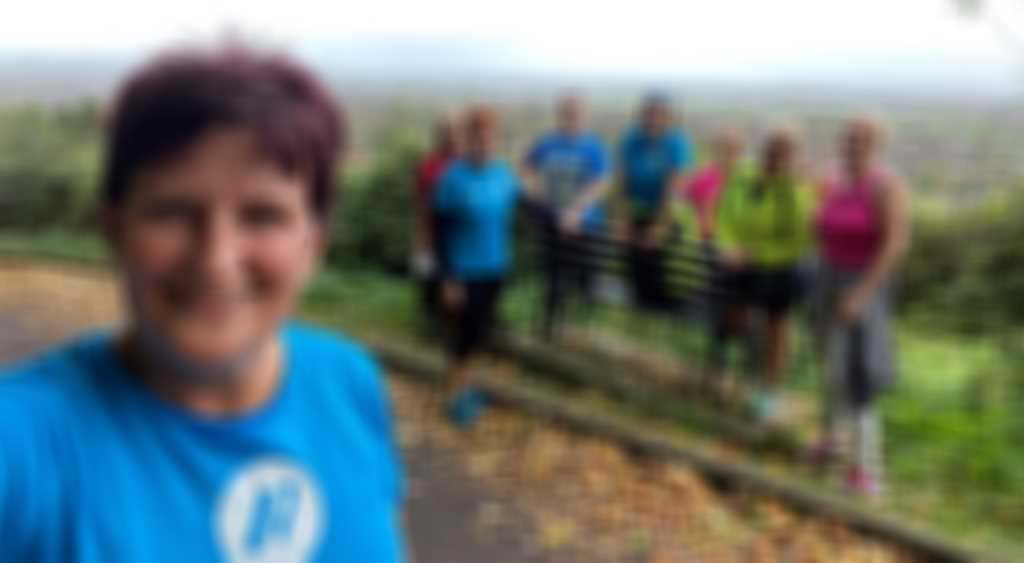 Kim Lewington With Run2help Group blurred out